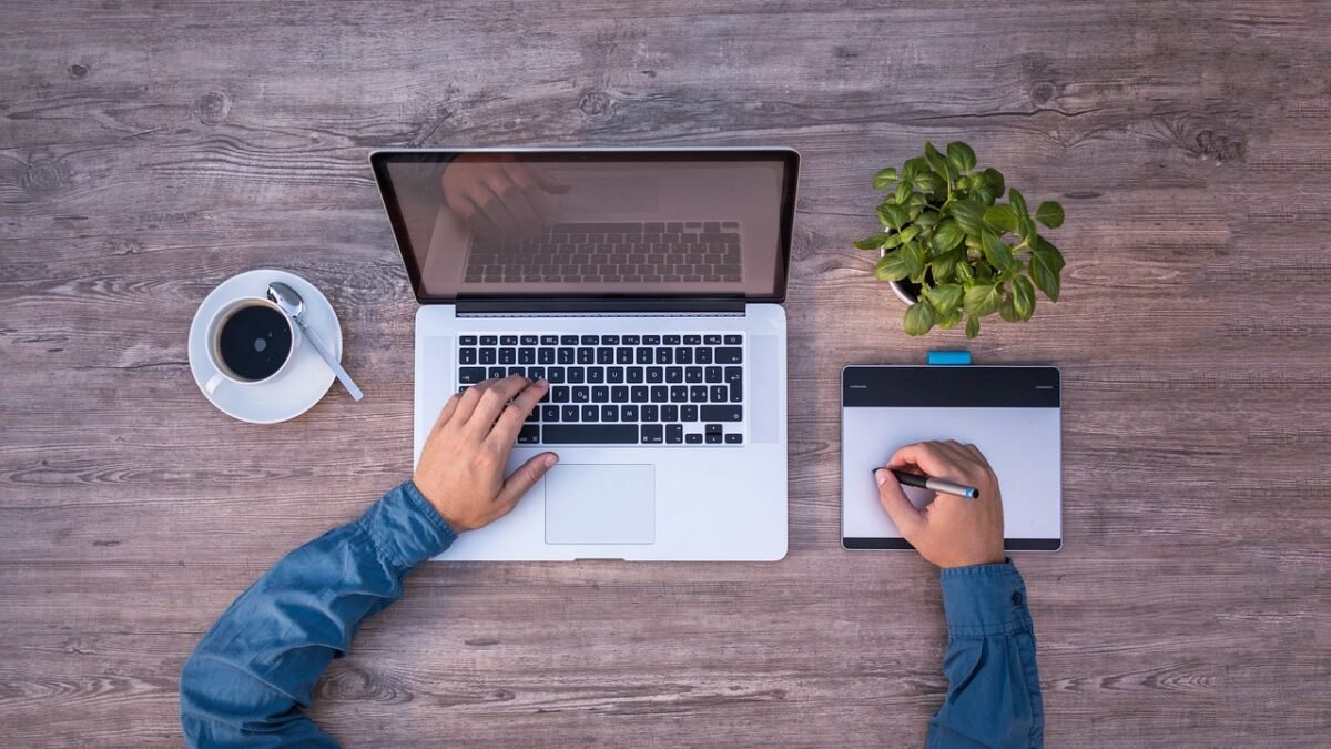 freelancer working on laptop at home
