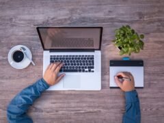freelancer working on laptop at home