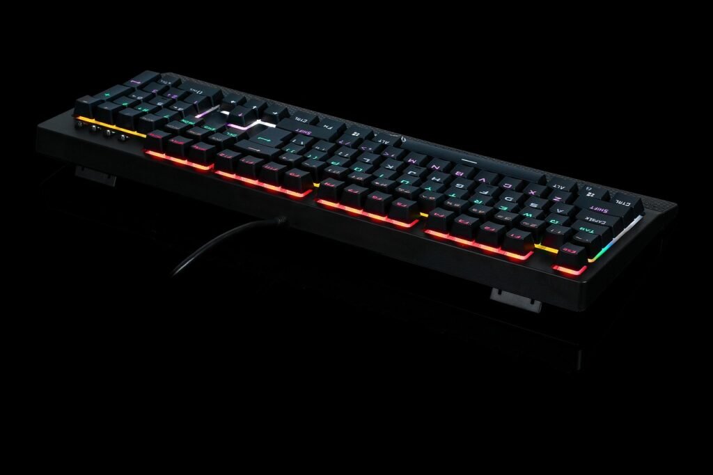 gamer playing mmorpg at night with rgb keyboard