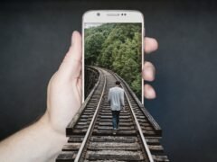 person recording product video smartphone home