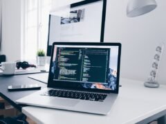 person uploading photo laptop
